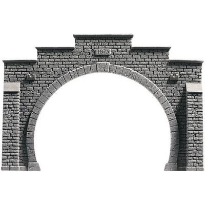 Historical stone arch with the inscription '1875' in the upper area, symbolising 19th-century architecture.