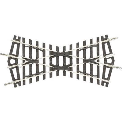 Railway junction with main lines and diverging points on a model railway layout.