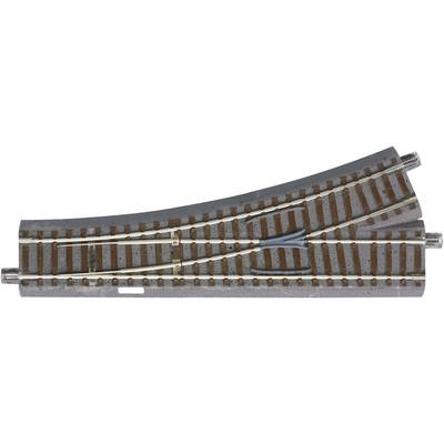 A curved model railway track section with a points/points switch provides direction and branching options for model trains.