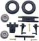 Two black tyres, two grey rims, black chassis and various black plastic parts for assembling a model car.
