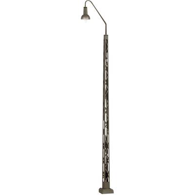 Street lamp with industrial design, slender pole with lattice structure, curved arm and circular light fitting.