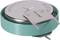 Varta button cell battery with a green casing and two metal clips for contact.