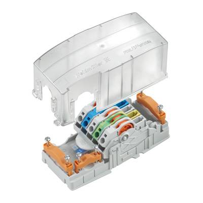 Illustration of a transparent cover lid on a multi-coloured electrical connection block, revealing internal connections.