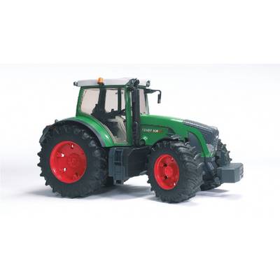 A green tractor with large black tyres and red rims is standing on a white background. The tractor has an enclosed cab.