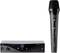 Wireless microphone set with microphone and receiver unit. The microphone features a digital display. The set is designed for wireless audio transmission.