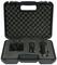 Black transport case with foam padding contains a microphone, a microphone stand, and a USB cable, neatly arranged.