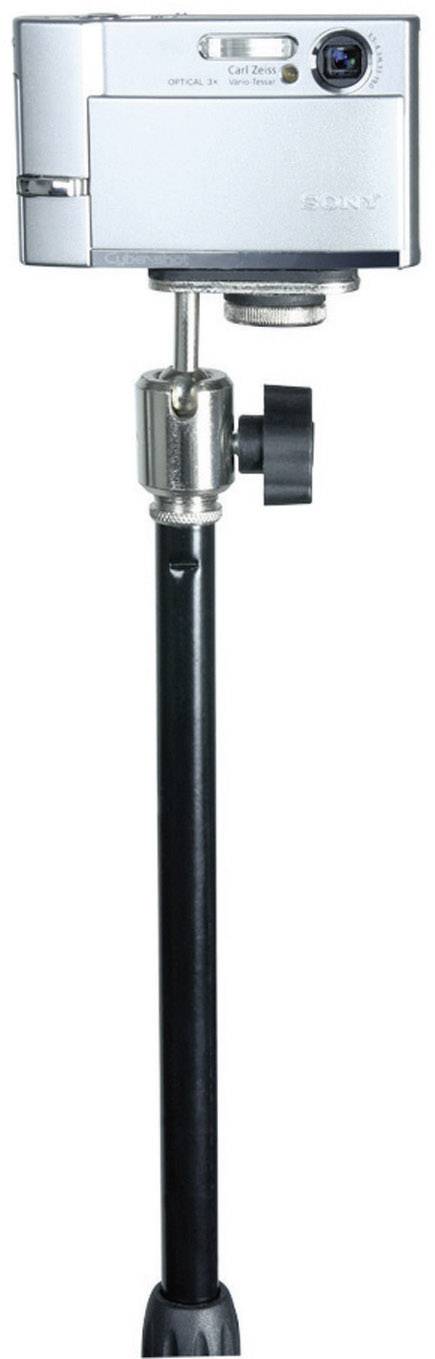 A silver digital camera on a black tripod, pointing forwards. Ideal for photography enthusiasts.