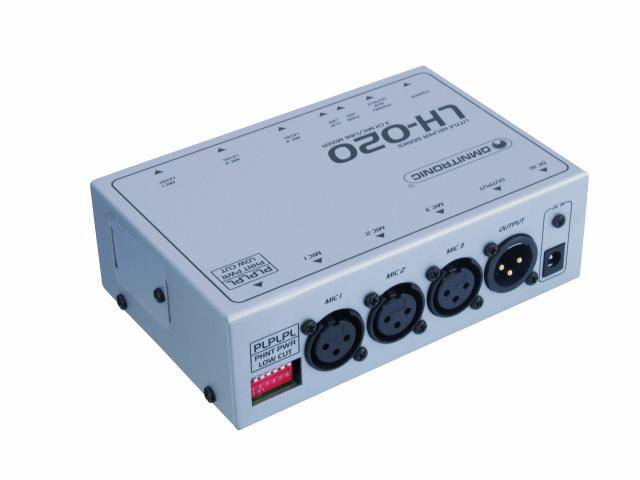 An audio interface device with three XLR connections, switches, and a power socket, suitable for microphone connections.