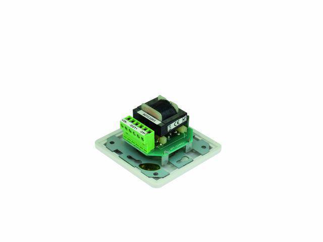 A green electronic circuit board in a metal housing, typical of socket components or switching elements in electrical installations.