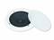 A white round speaker with its cover removed, revealing the black membrane inside.