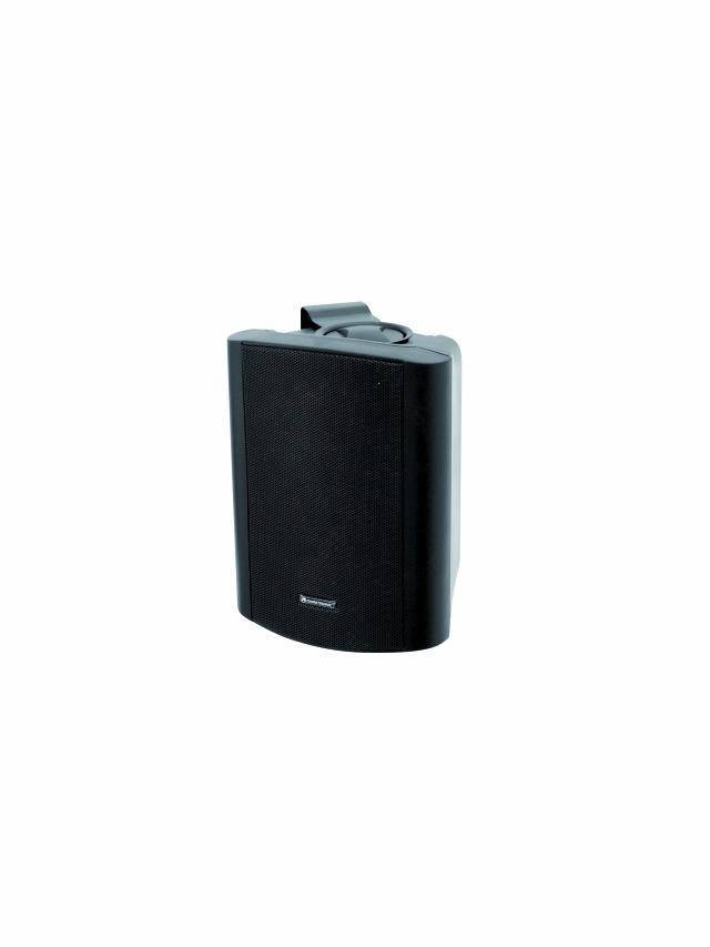 A black speaker with rounded edges and a small handle on the top, against a white background.
