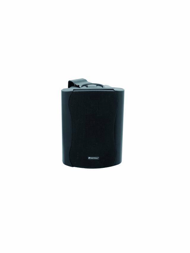 Black speaker with carry handle, standing freely against a white background.