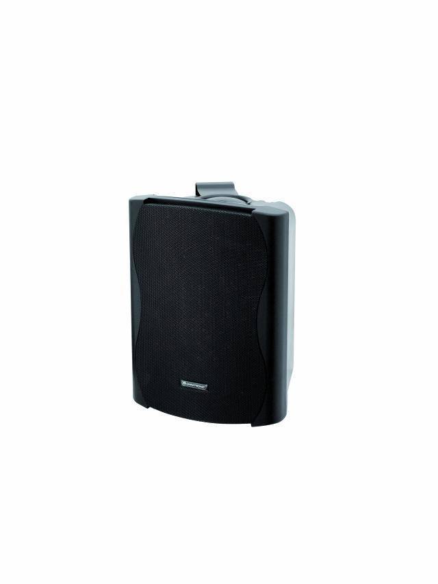 A black, rectangular speaker with rounded edges and a speaker grille at the front is shown.