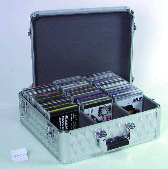 'Open silver briefcase with numerous CDs in various compartments, some with visible album covers.'