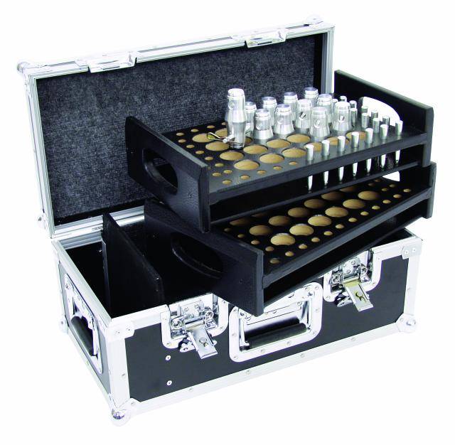 Black, open transport case with multiple levels containing circular compartments for metal bottles.