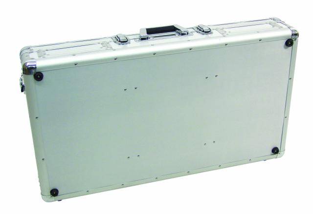 Silver, rectangular aluminium case with black handle and reinforced corners, standing upright.
