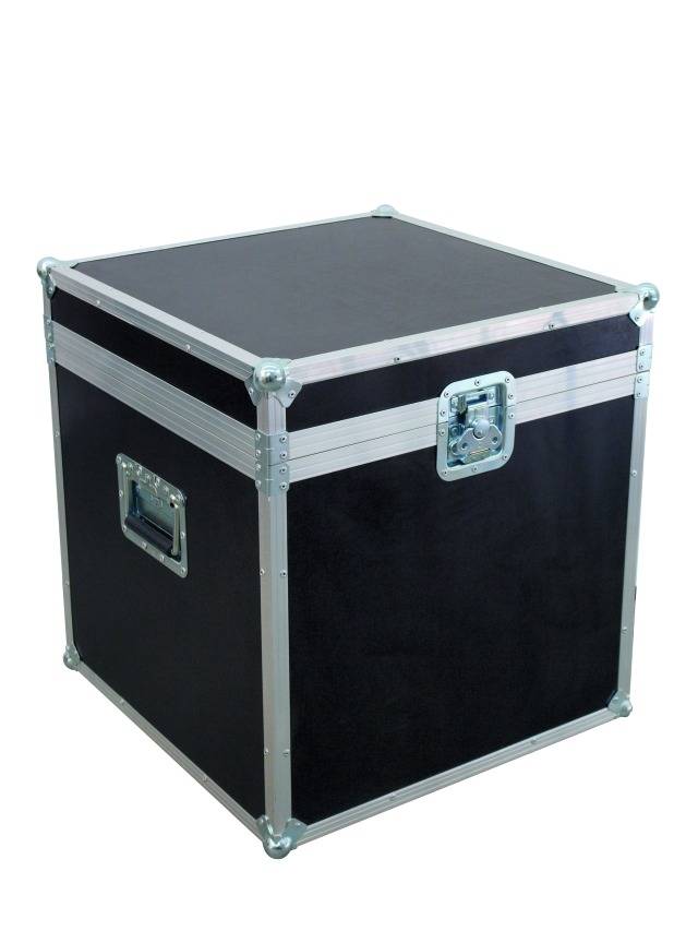 A black, cubic equipment case with reinforced edges, metal handles, and clasps. Used for secure transportation.