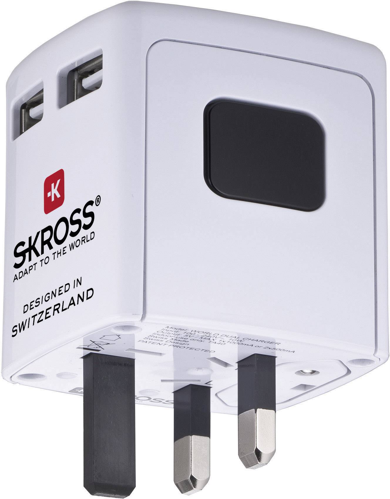 A white travel adapter by SKROSS with two USB ports and British plug design, labelled 'Designed in Switzerland'.