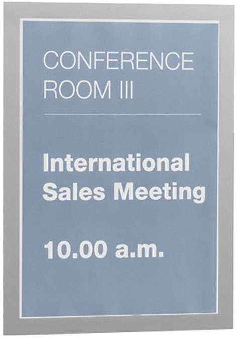 Sign reading: 'CONFERENCE ROOM III. International Sales Meeting. 10.00 a.m.'