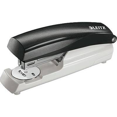 Black and white Leitz office stapler lying on a white surface, ready to be used for fastening paper.