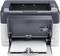 Printer with an open paper tray and visible sheets of paper. Control buttons and indicator lights at the top, ready to print.