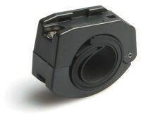 A black, semi-circular industrial component with an opening in the centre and small mounting screws on the top surface.