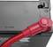 A car battery with a red positive terminal cable. The cable is connected to the positive terminal, visible in the top right corner of the battery.
