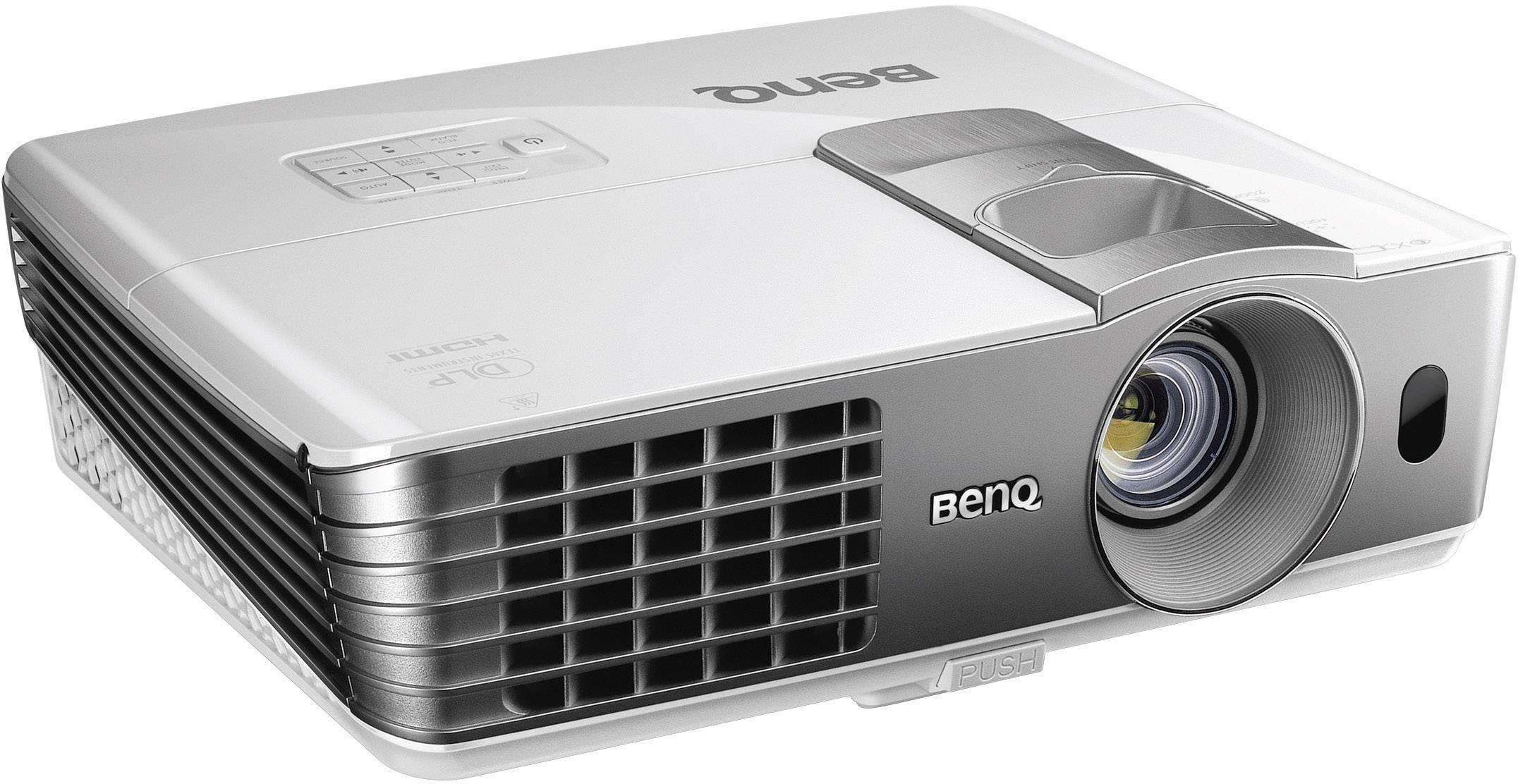 A silver-black BenQ projector with ventilation slots and a lens on the front, photographed from an angled overhead perspective.