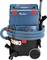 Industrial vacuum cleaner by Bosch with blue box, hoses, and wheels. Suitable for professional cleaning tasks.