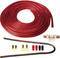 Red power cable, ring-shaped, with accessories such as fuse, connectors and small cables, likely for audio installations in a car.