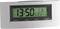 Digital radio-controlled clock shows 13:50. Date: 2/1. Temperature: 21.1 °C. Functions: Mode, Alarm, 12/24 hr, °C/°F.