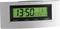 A digital radio-controlled clock displays 13:50. The display also shows the date 2-7 and the temperature 21.1°C.