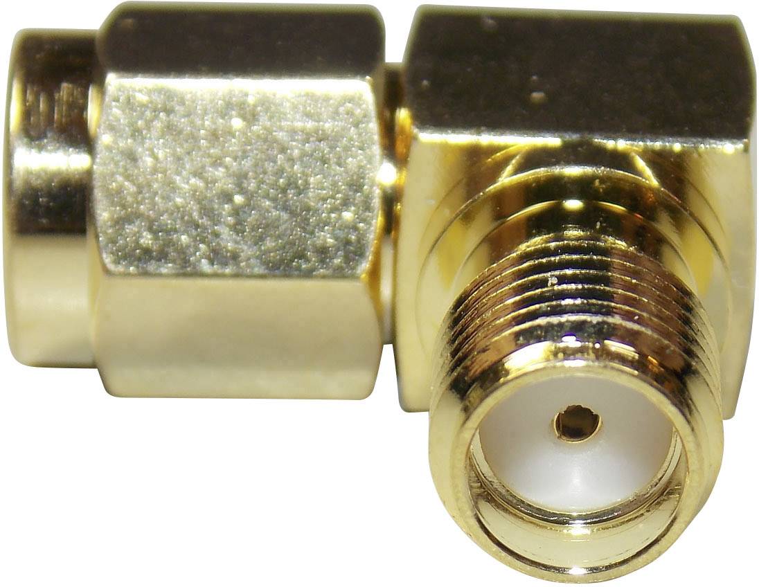 A golden right-angle coaxial cable adapter.