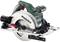 A green Metabo circular hand saw, with a silver saw blade and red safety switch, on a white background.