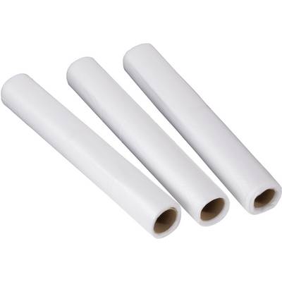 Three white plastic reels are lying side by side on a light background.