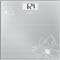 'Digital scales with a silver surface and floral pattern showing 62.4 kg.'
