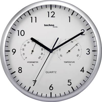 A silver-framed analogue wall clock shows 10:09. Smaller dials display a hygrometer (% humidity) and temperature (°C).