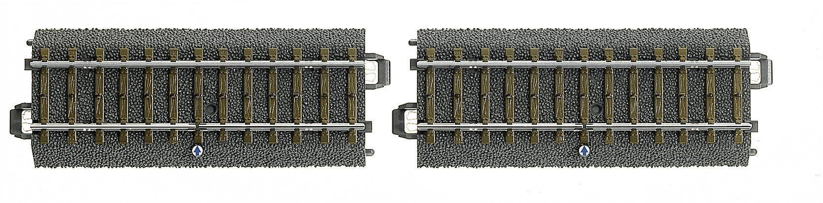 Two model railway tracks in grey tones, parallel to each other, show realistic details such as ballast bed and sleepers.