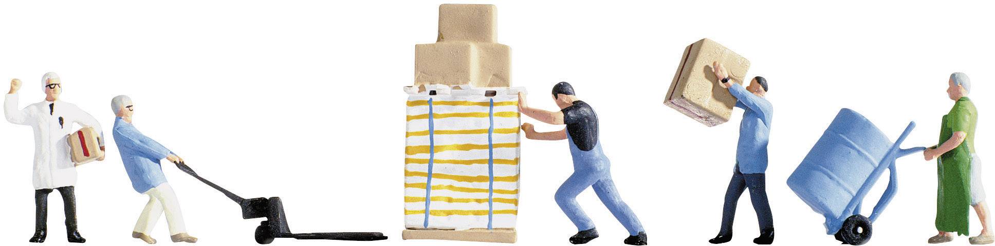 Miniature figures in workwear are transporting and stacking crates. One figure is lifting boxes, while another is pushing a trolley.