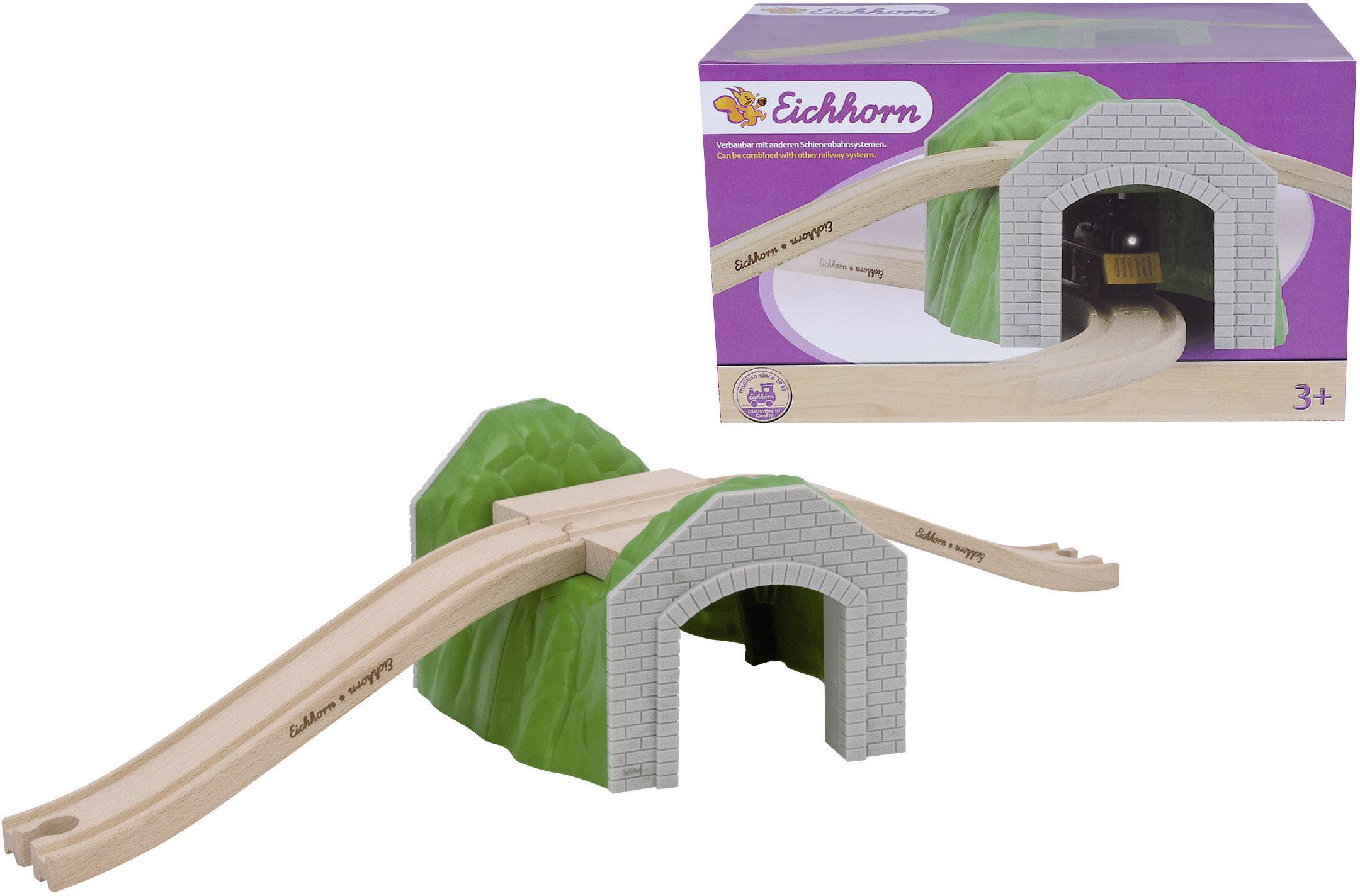 wooden train set with tunnels