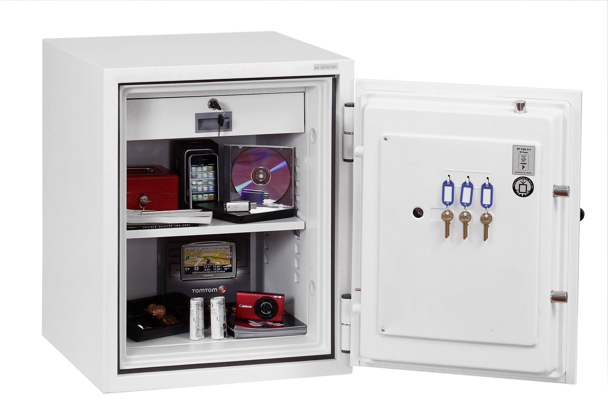 Open safe with two compartments, containing electronics, jewellery, documents and coins. Three keys are hanging on the door.