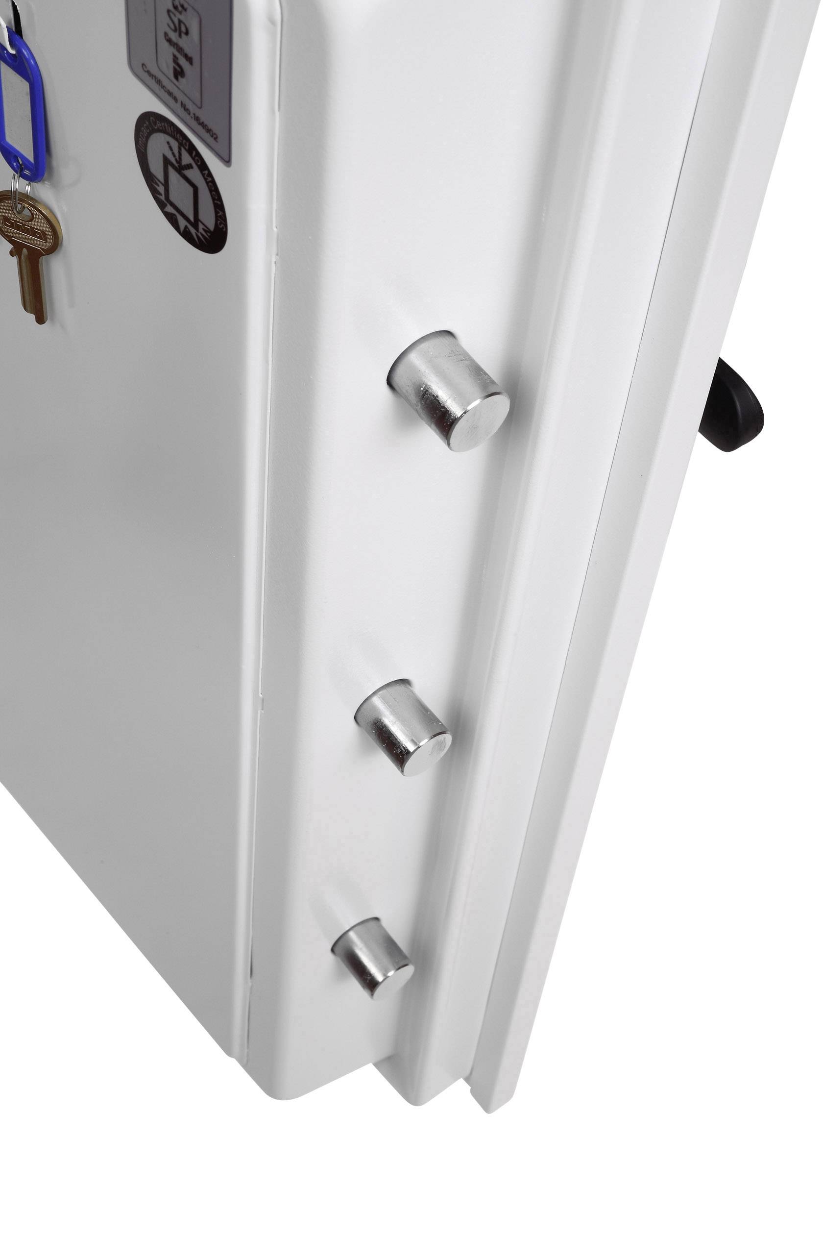 An open safe with visible metal bolts on the door. Keys are hanging on the inside.