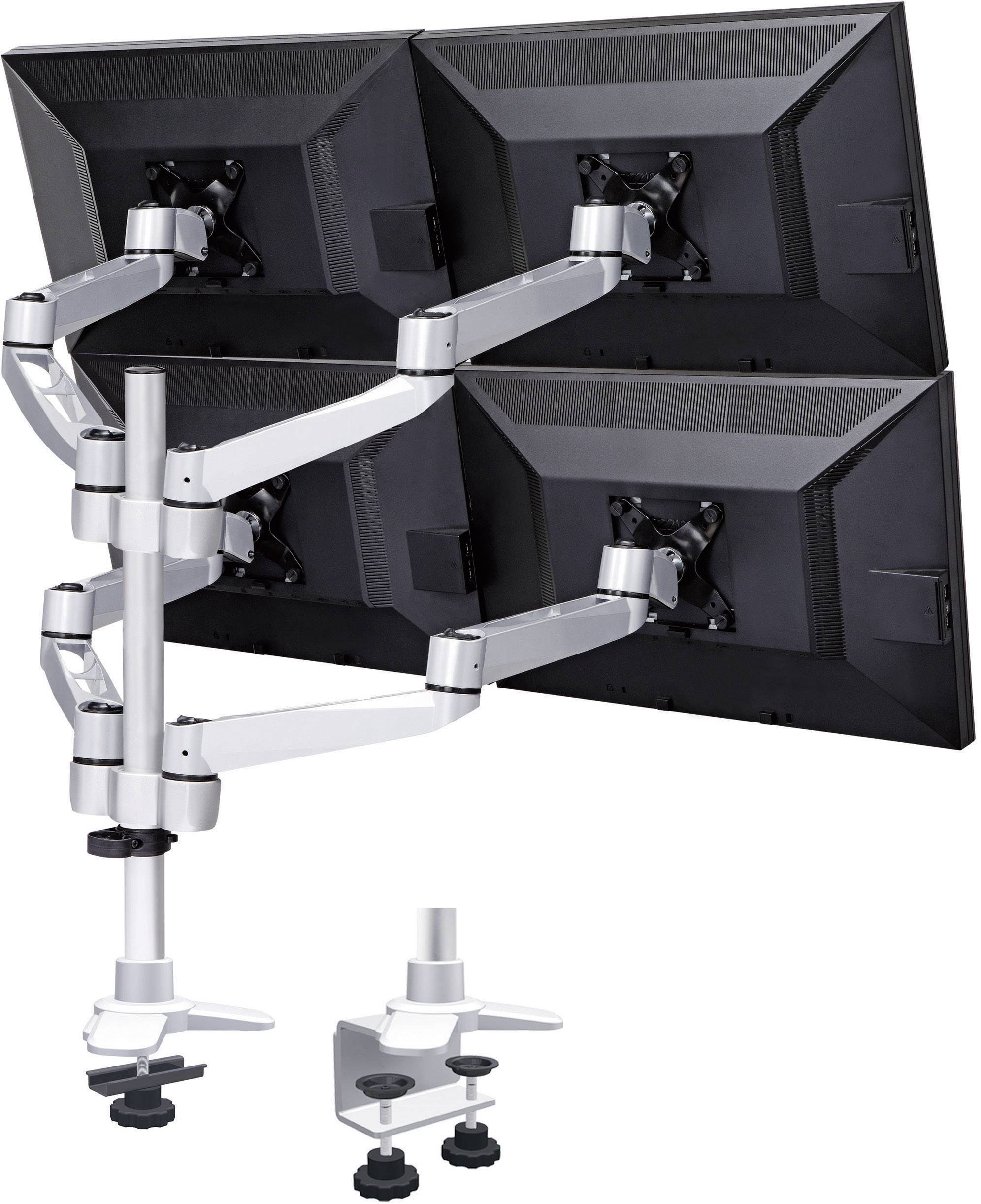 Four monitors mounted on a bracket attached to a desk. The monitors are arranged in two rows.
