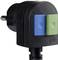 A black plug with two buttons, one blue and one green, which have functions for testing and resetting.