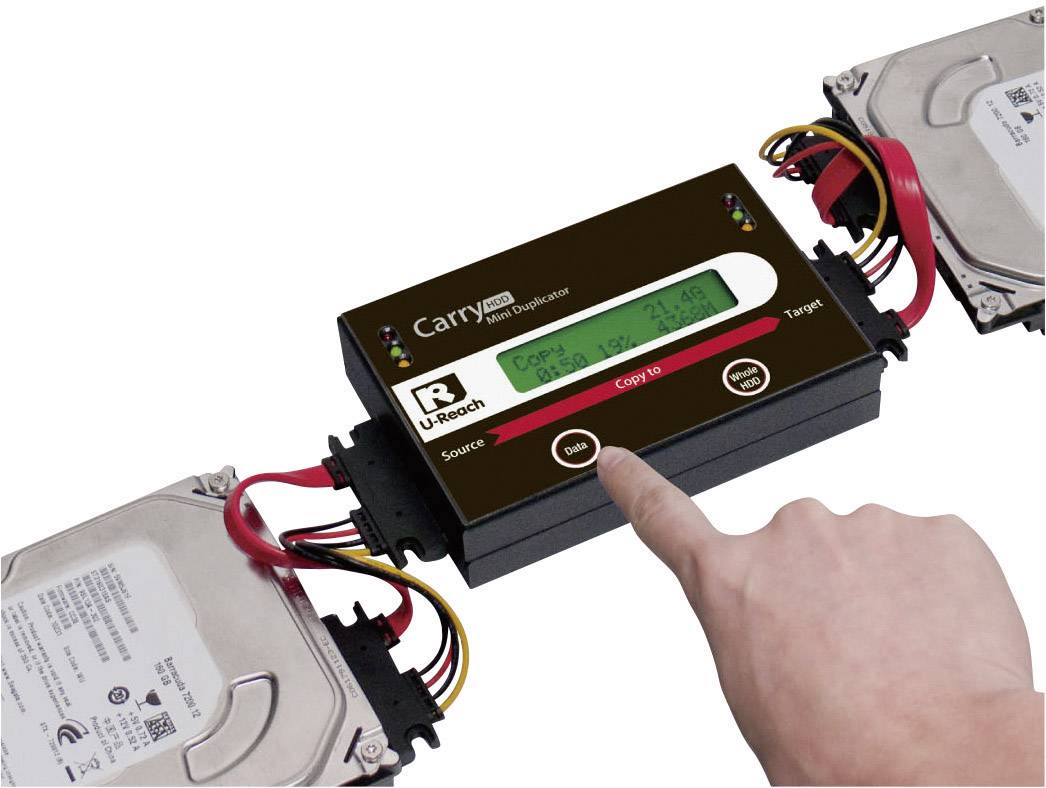 A hand is operating a hard drive duplication device that is transferring data between two hard drives. A display shows 'Copy ID'.