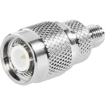 A silver RF coaxial plug with a knurled handle and male connection shows its central pin connection.