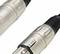 Close-up of two XLR connectors, typical for audio connections, with silver casings and black ends.