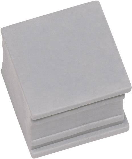 A grey, square concrete block with a smooth surface and stepped base, used as a building element or decorative feature.