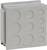 A rectangular, grey box with several round recesses on the front.