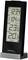 Digital weather station with large display. Shows the time as 12:34, date 11/04. Friday, indoor and outdoor temperatures of 23°C and 20°C.
